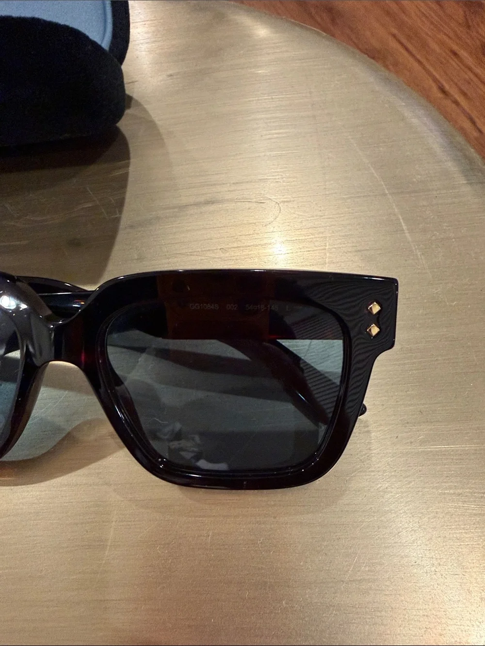 Gucci Sunglasses with dark Havana frame and blue lenses